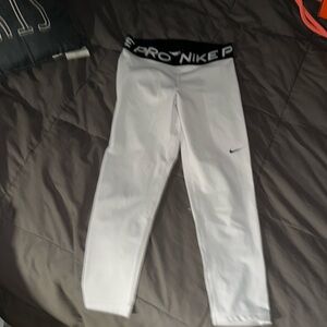 Great condition white Nike Pro Leggings with black band at top, size S